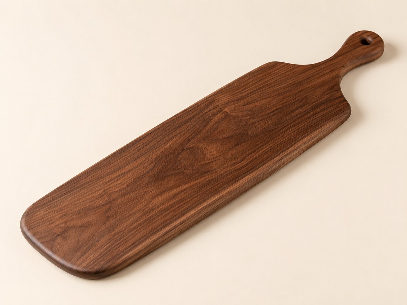 Walnut Paddle Board handmade by Novelty Woodworks