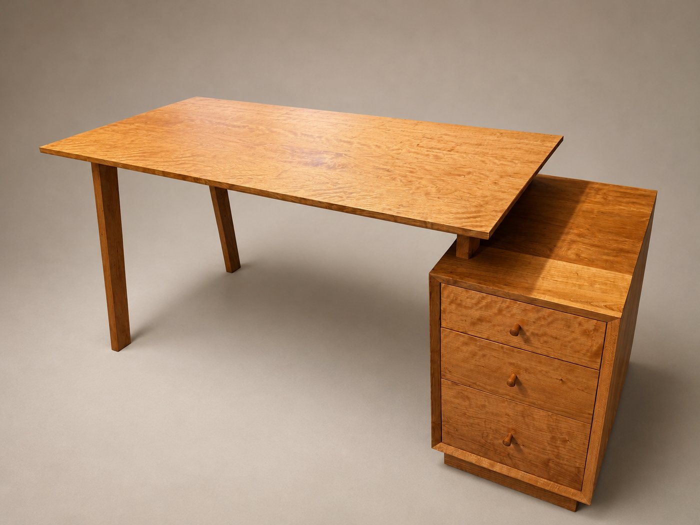 Cherry writing desk with figured top, handmade by Novelty Woodworks